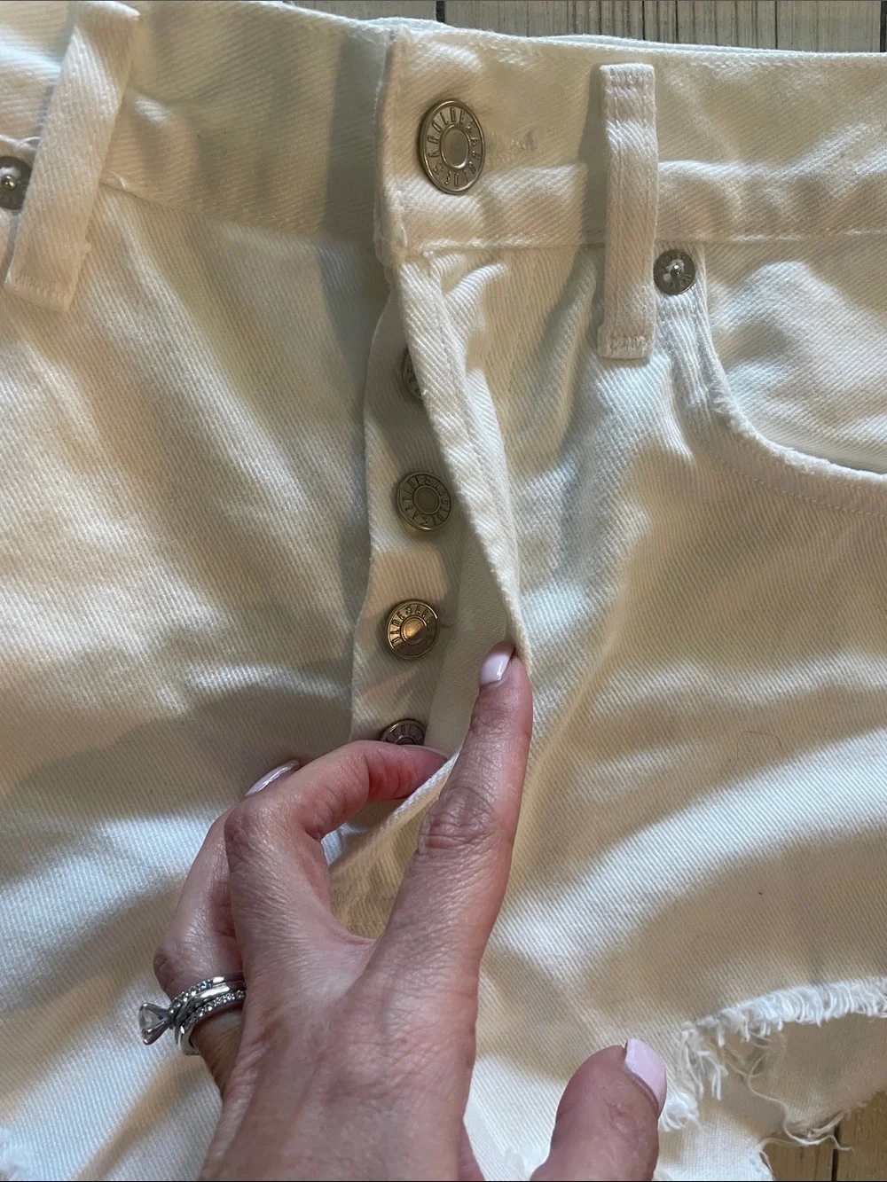 AGOLDE White Distressed Cutoff Denim Shorts